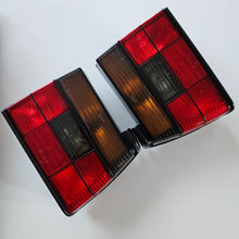 Load image into Gallery viewer, Hella Smoked Tail Light Set Jetta Mk2
