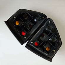 Load image into Gallery viewer, Hella Treser Smoked Tail Light Set Golf Mk2
