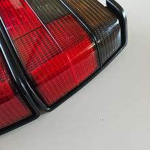 Load image into Gallery viewer, Hella Smoked Tail Light Set Jetta Mk2
