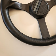 Load image into Gallery viewer, Hella Sport Steering Wheel By Momo
