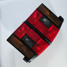 Load image into Gallery viewer, Hella Smoked Tail Light Set Jetta Mk2
