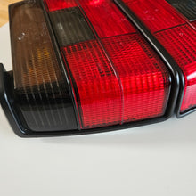 Load image into Gallery viewer, Hella Smoked Tail Light Set Jetta Mk2
