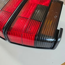 Load image into Gallery viewer, Hella Smoked Tail Light Set Jetta Mk2
