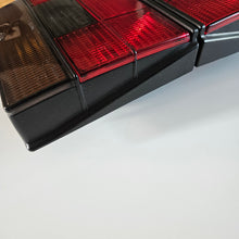 Load image into Gallery viewer, Hella Smoked Tail Light Set Jetta Mk2
