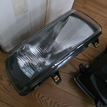 Load image into Gallery viewer, Smoked In.Pro E-Code Headlight Set Vento/Jetta Mk3

